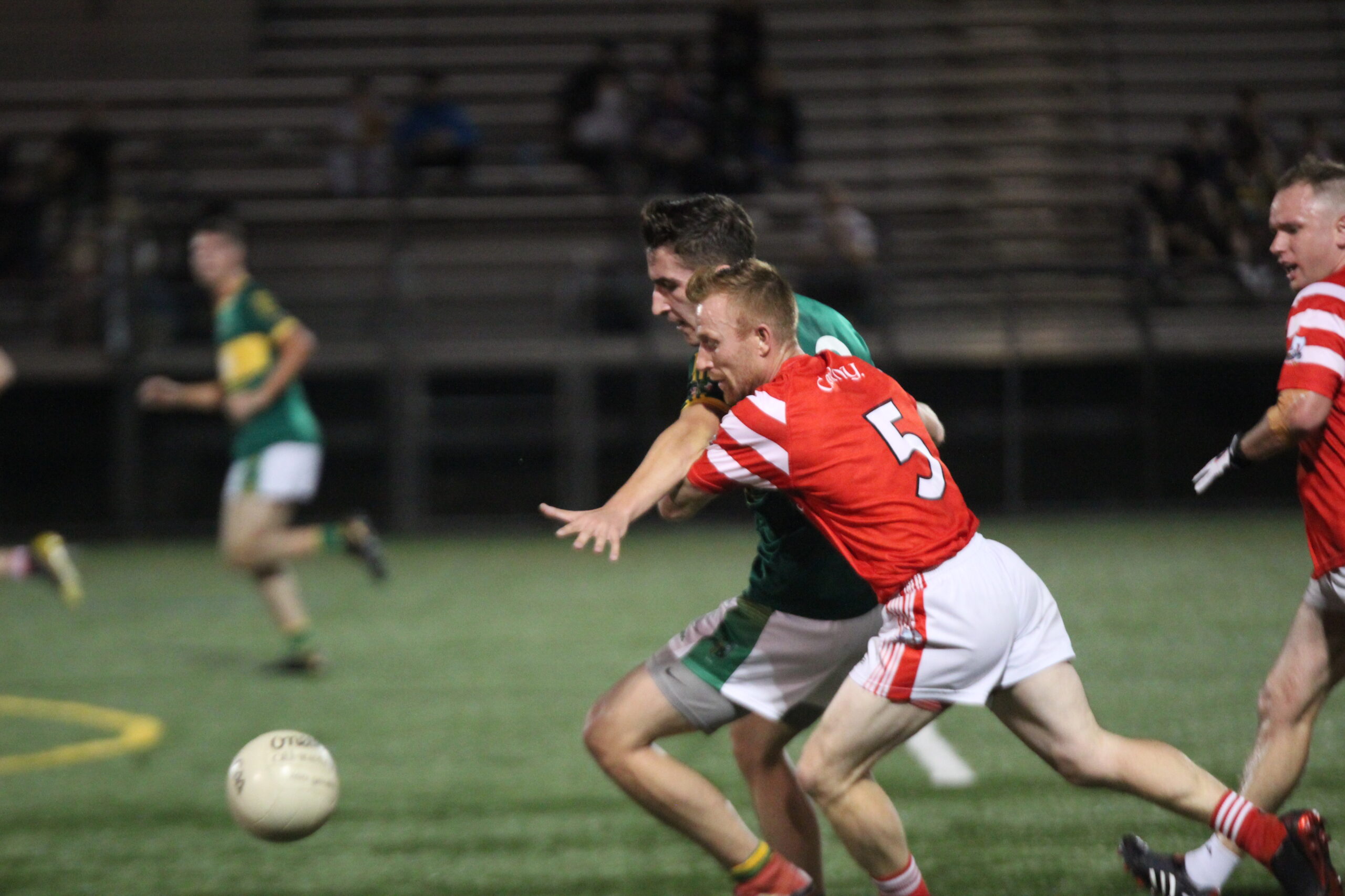 Action from Cork v St. Barnabas in the 2021 Bew York Junior A Football Final (Photo by Sharon Redican)