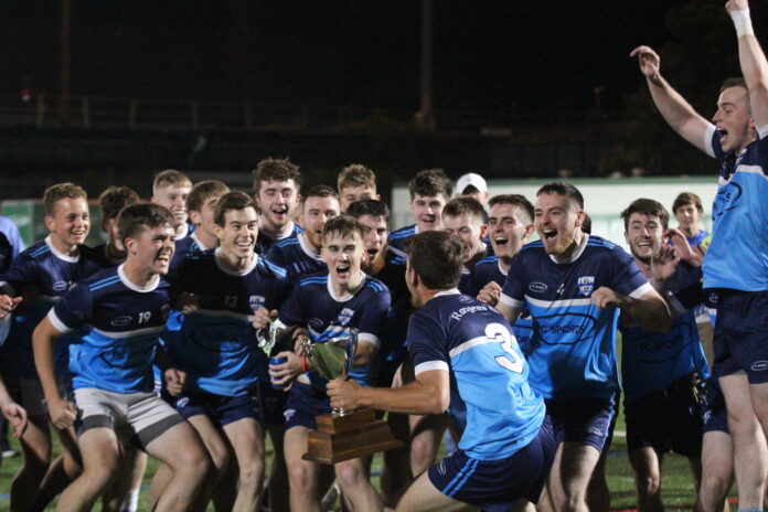 Rangers captain Dan Burke about to lift the cup among his teammates after Rangers GFC won the 2021 New York Junior B Football Final (Photo by Sharon Redican)