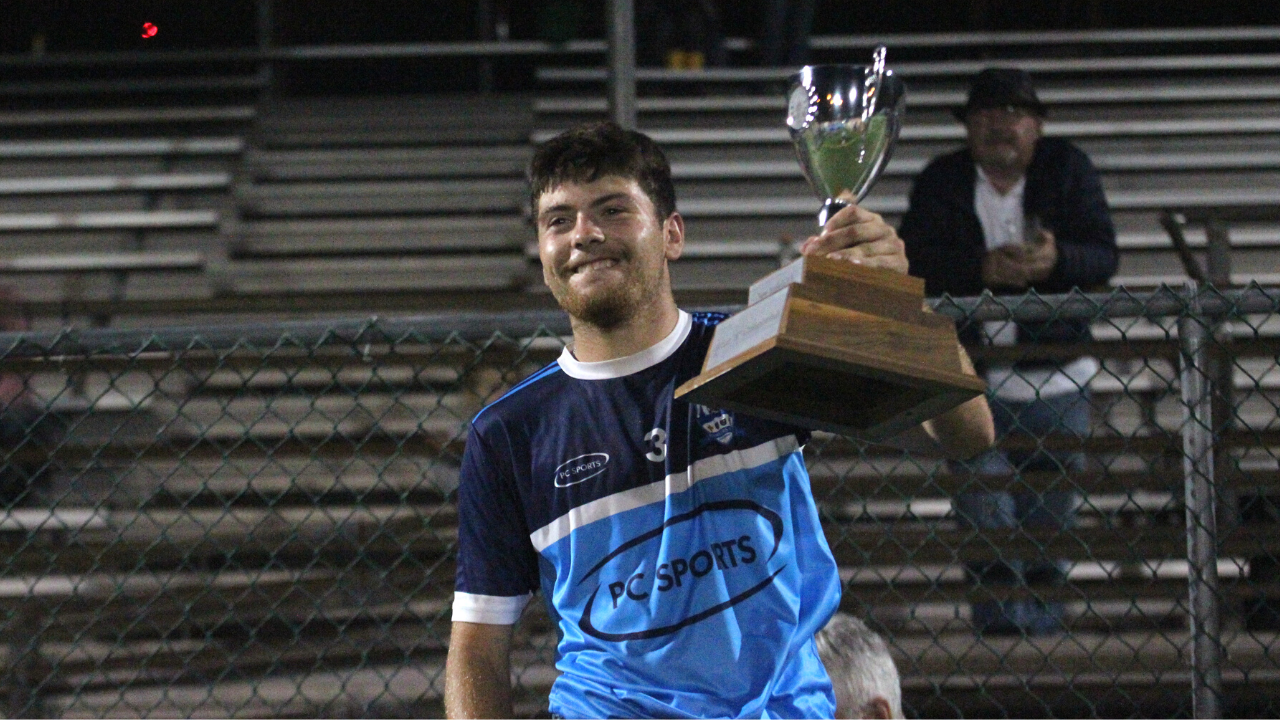 Rangers captain Dan Burke lifts the cup after Rangers GFC won the 2021 New York Junior B Football Final (Photo by Sharon Redican) 