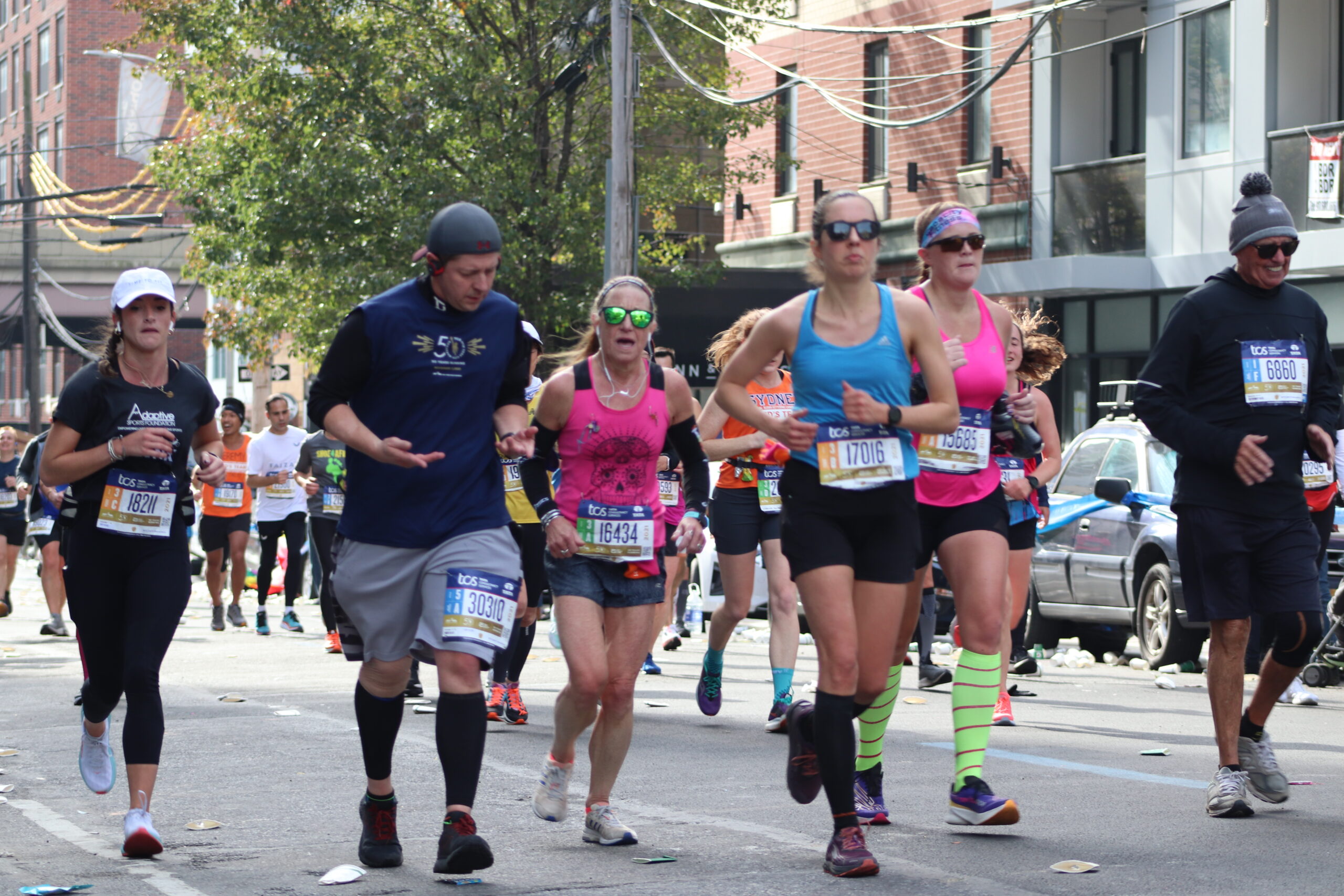 Runners at the Queens section of the New York City marathon route (Photo by Michael Dorgan, The Long Hall Podcast)