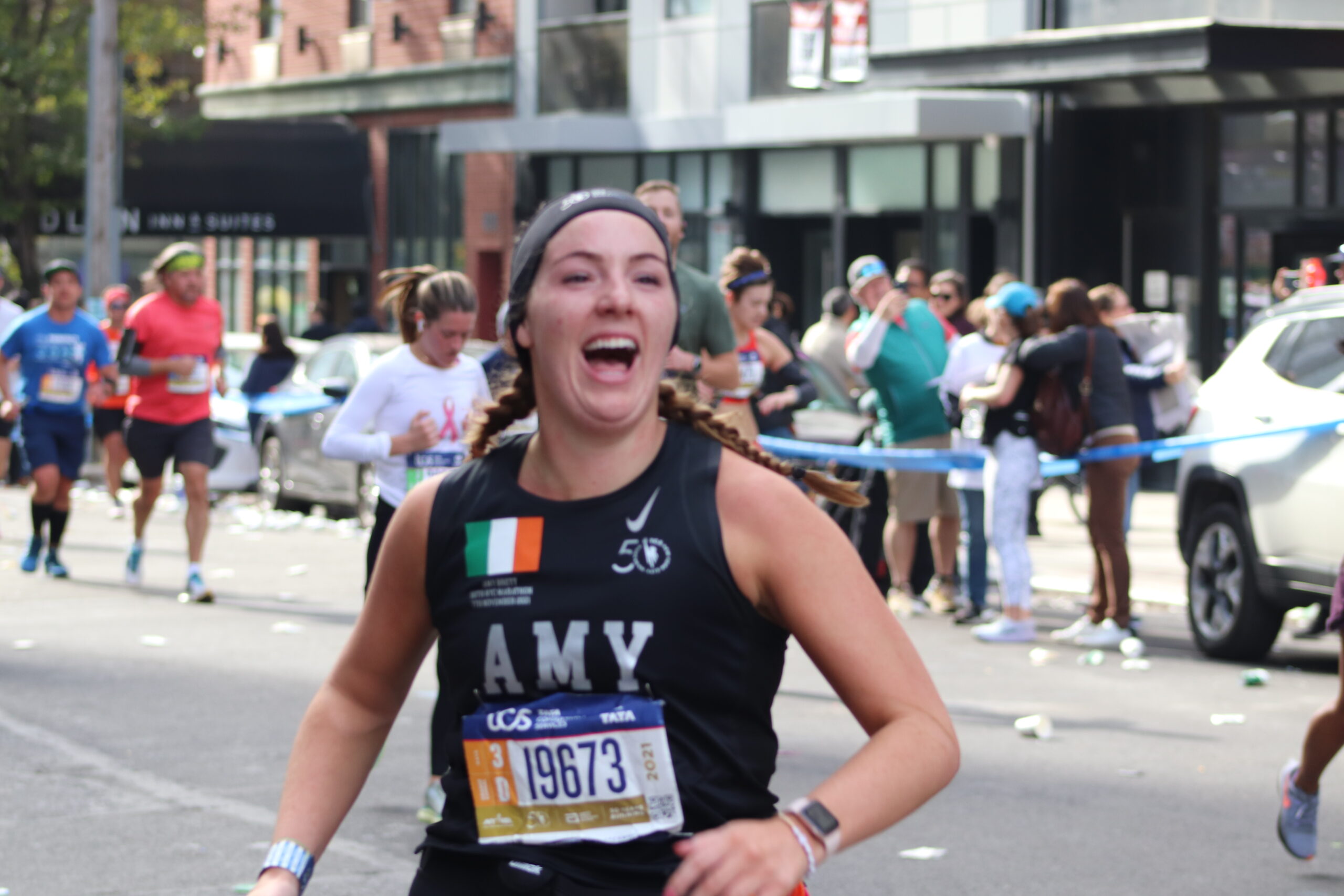 The Long Hall Podcast GAA reporter Amy Brett, running through the Queens section of the New York City marathon route (Photo by Michael Dorgan, The Long Hall Podcast)