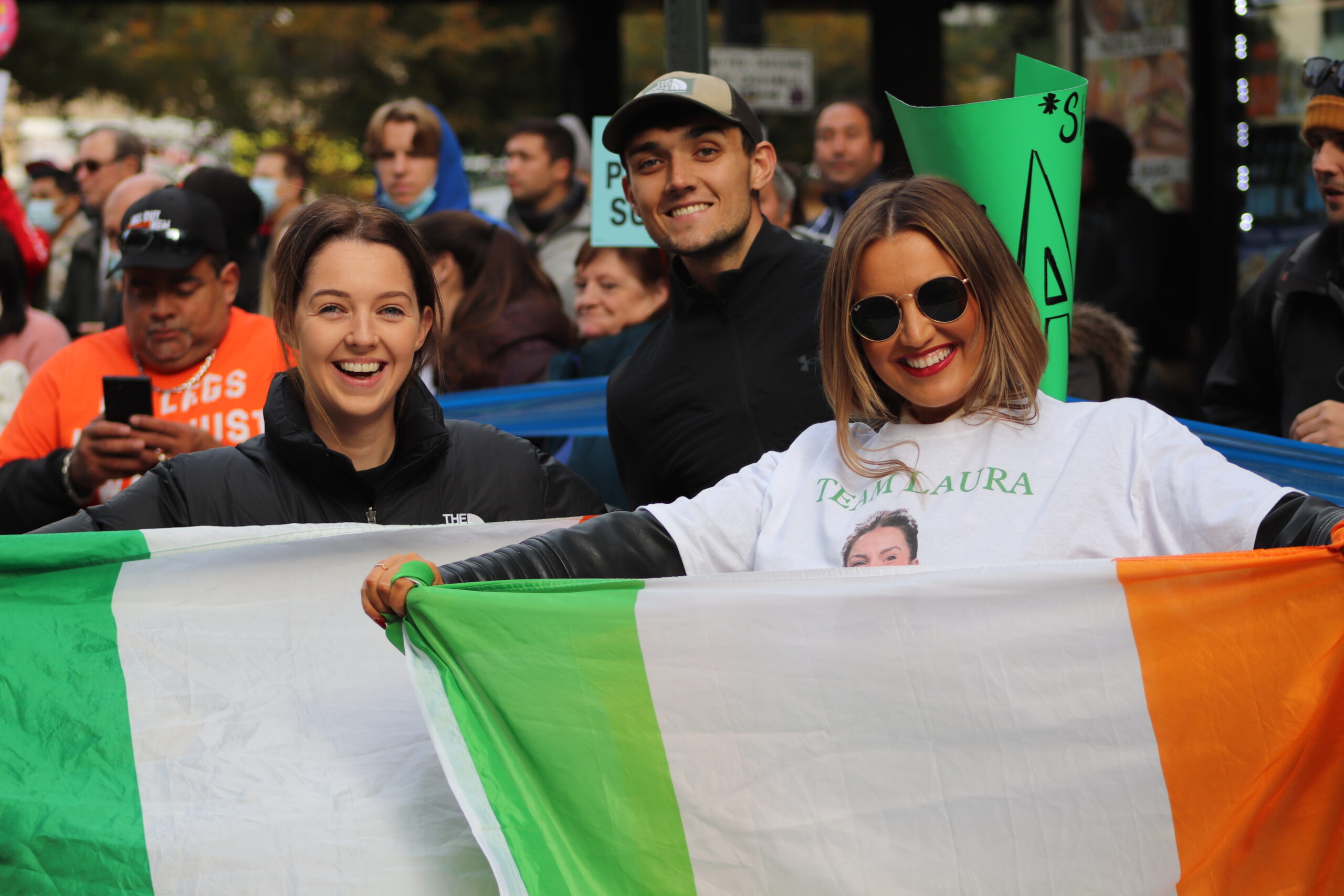 Caron McCormack (L), Peter Fox (C) Niamh Reilly (R) supporting the Irish runners taking part in the 2021 New York City Marathon in Queens (Photo by Michael Dorgan, The Long Hall Podcast)