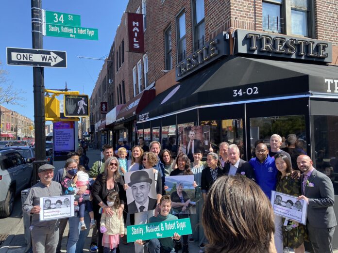 A street in Astoria was co-named in honor of an Irish American family who were activists for LGBT rights and stopping the spread of AIDS. Pictured are attendees at the ceremony earlier this month (Photo via Twitter @NYCComptroller)